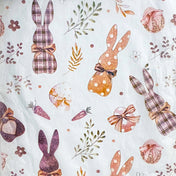 tissue paper with Pattern of brown rabbits, bows, and flowers on a white background