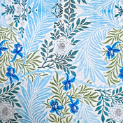  tissue paper with a with blue and green floral and leaf designs on a white background