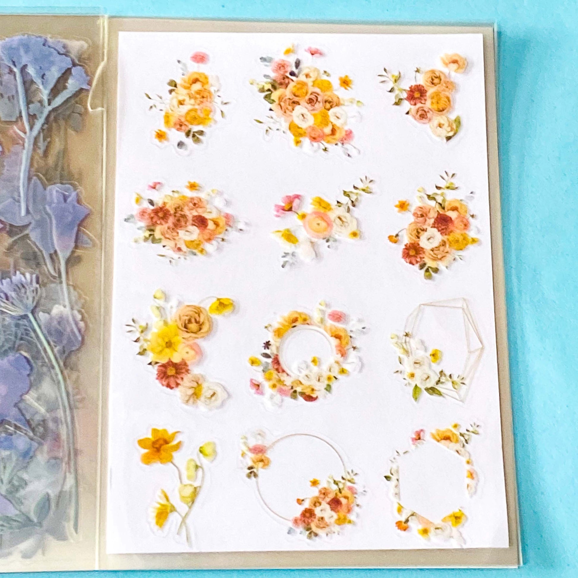 vintage floral clear sticker book with 20 pages of botanical flower stickers including rose, daisy, sunflowers and blossom.
