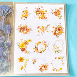 vintage floral clear sticker book with 20 pages of botanical flower stickers including rose, daisy, sunflowers and blossom.
