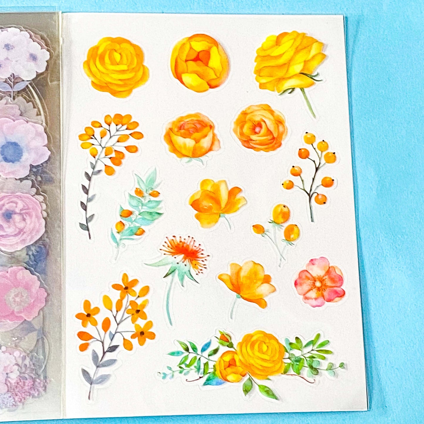 vintage floral clear sticker book with 20 pages of botanical flower stickers including rose, daisy, sunflowers and blossom.