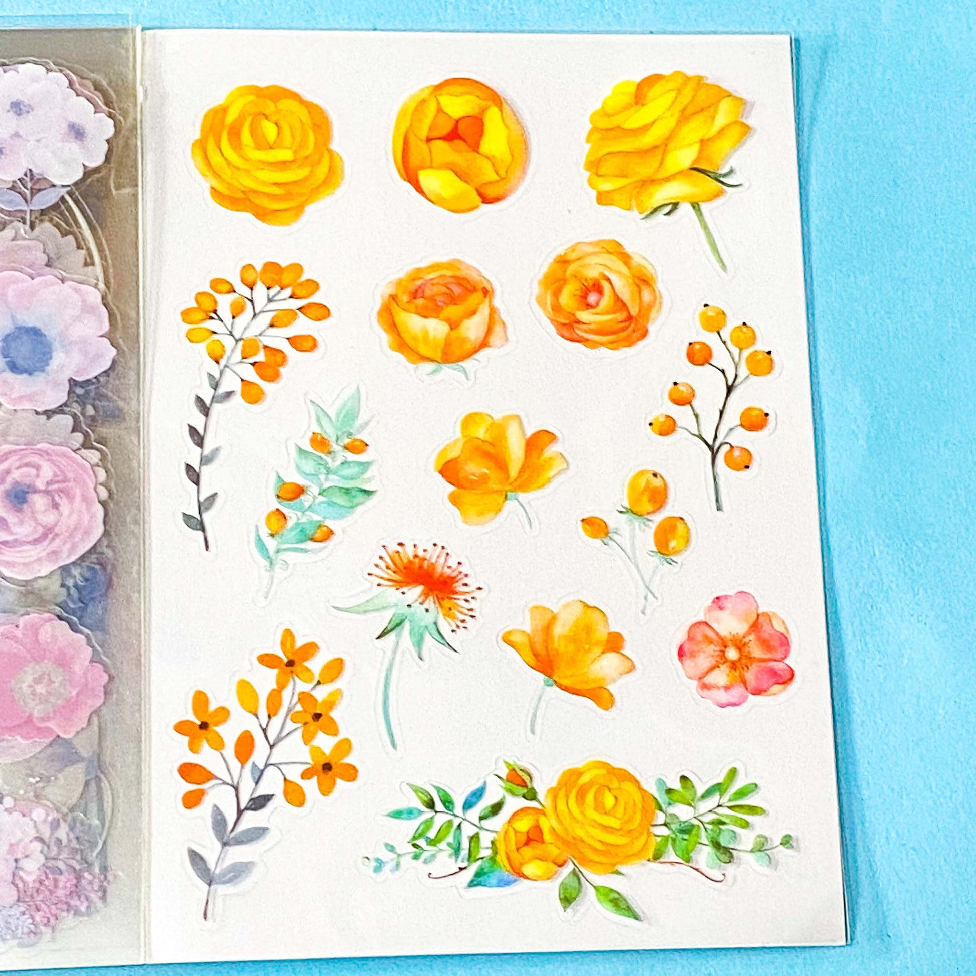vintage floral clear sticker book with 20 pages of botanical flower stickers including rose, daisy, sunflowers and blossom.