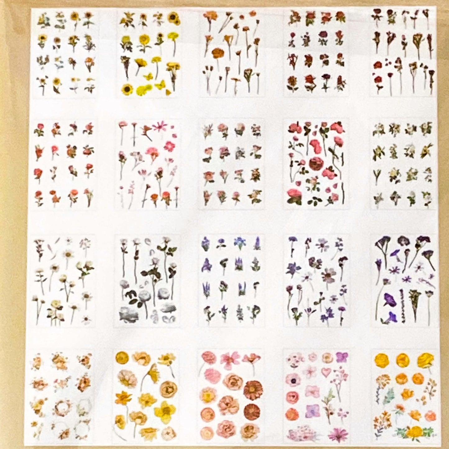 vintage floral clear sticker book with 20 pages of botanical flower stickers including rose, daisy, sunflowers and blossom.