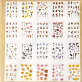 vintage floral clear sticker book with 20 pages of botanical flower stickers including rose, daisy, sunflowers and blossom.