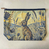 vintage moonrise hare moonlit cosmetic bag or make up pouch with muted colours and botanical illustration of grasses, hares and night sky. uk letterbox gifts shop.