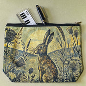 vintage moonrise hare moonlit cosmetic bag or make up pouch with muted colours and botanical illustration of grasses, hares and night sky. uk letterbox gifts shop.