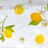 pack of 3 sheets white tissue paper with yellow lemons and pale pink blossoms with green leaves. citrus grove pattern. uk packaging supplies.