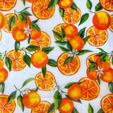 bright juicy orange fruits on white tissue paper sheets. Pack of 3 sheet in vibrant oranges and greens for summertime gifting. Uk packaging supplies. 