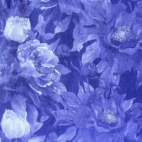 deep inky purple dark blue indigo floral pattern tissue paper with large poppies at midnight. Beautiful packaging papers from the Uk.