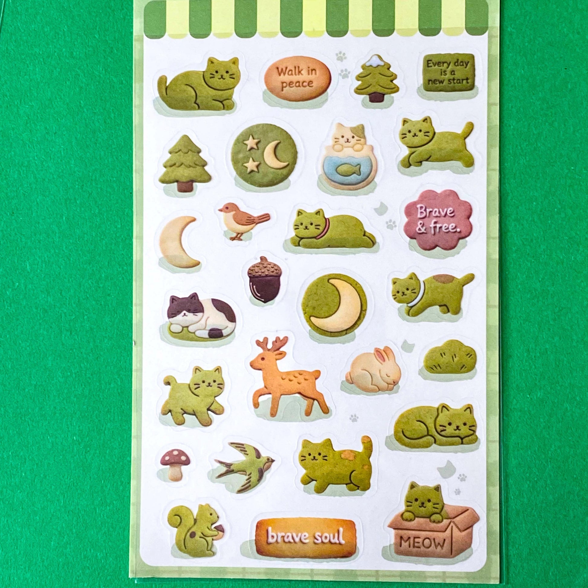 green themed cozy cats cookie sticker pack of 2 sheets with cute animals and sayings. PET transparent sheets with deer, christmas tree, birds, kittens and cookies.