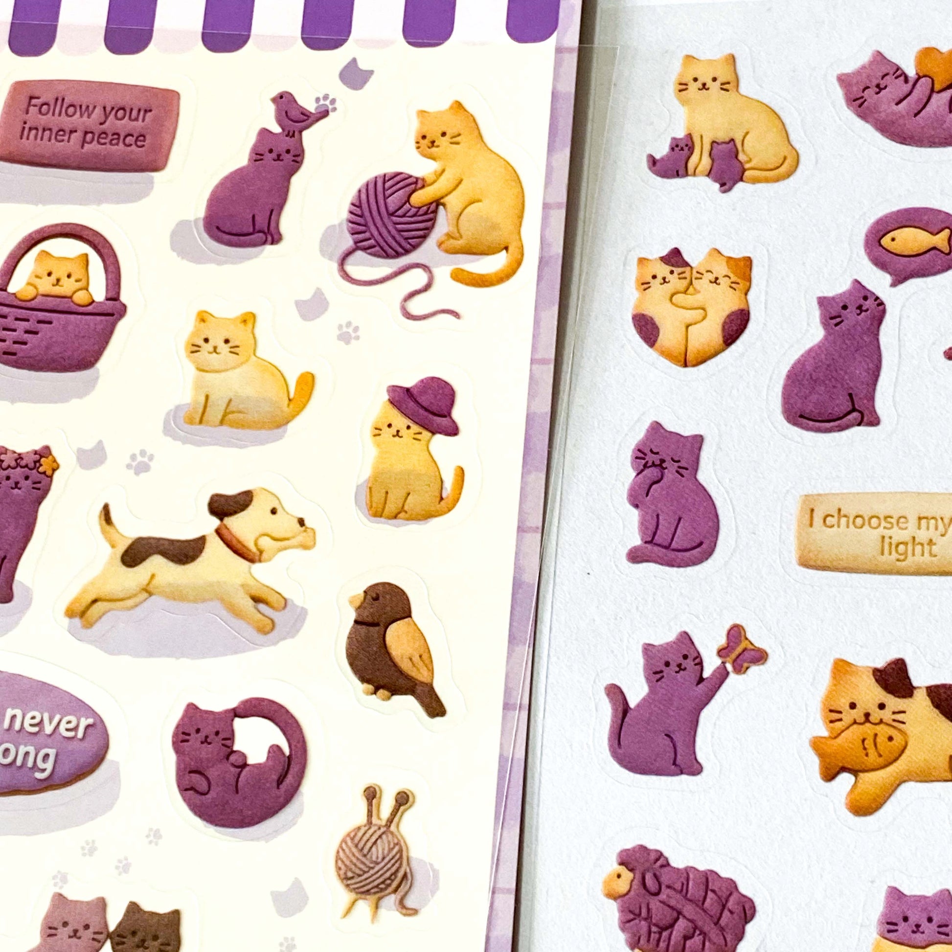 purple themed cats and cookies sticker pack of 2 clear PET sheets. featuring foods and animals with a textured biscuit design. Uk cute stationery.