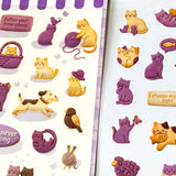 purple themed cats and cookies sticker pack of 2 clear PET sheets. featuring foods and animals with a textured biscuit design. Uk cute stationery.