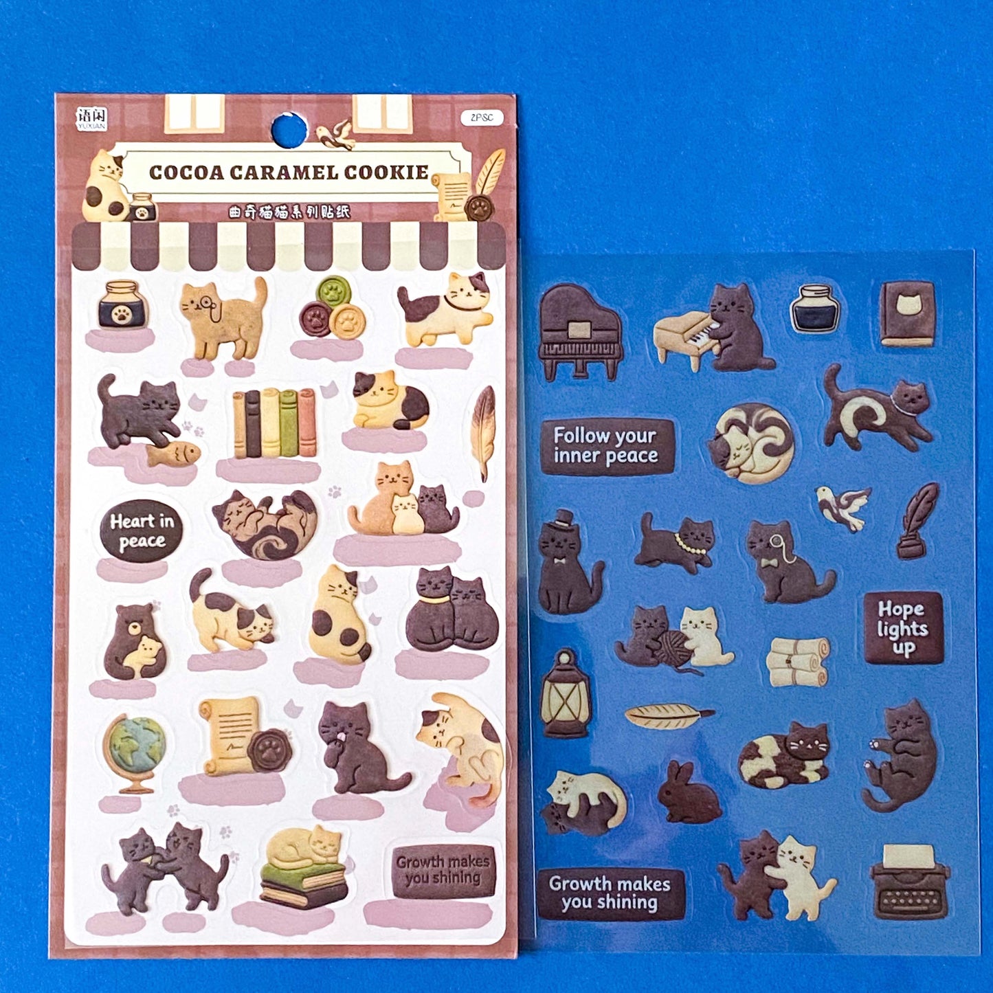 brown and cream themed sticker sheets of cookies and cats. Biscuit designs of cute cats and other animals with food and drinks. Home themed. Pack of 2 PET clear sheets.