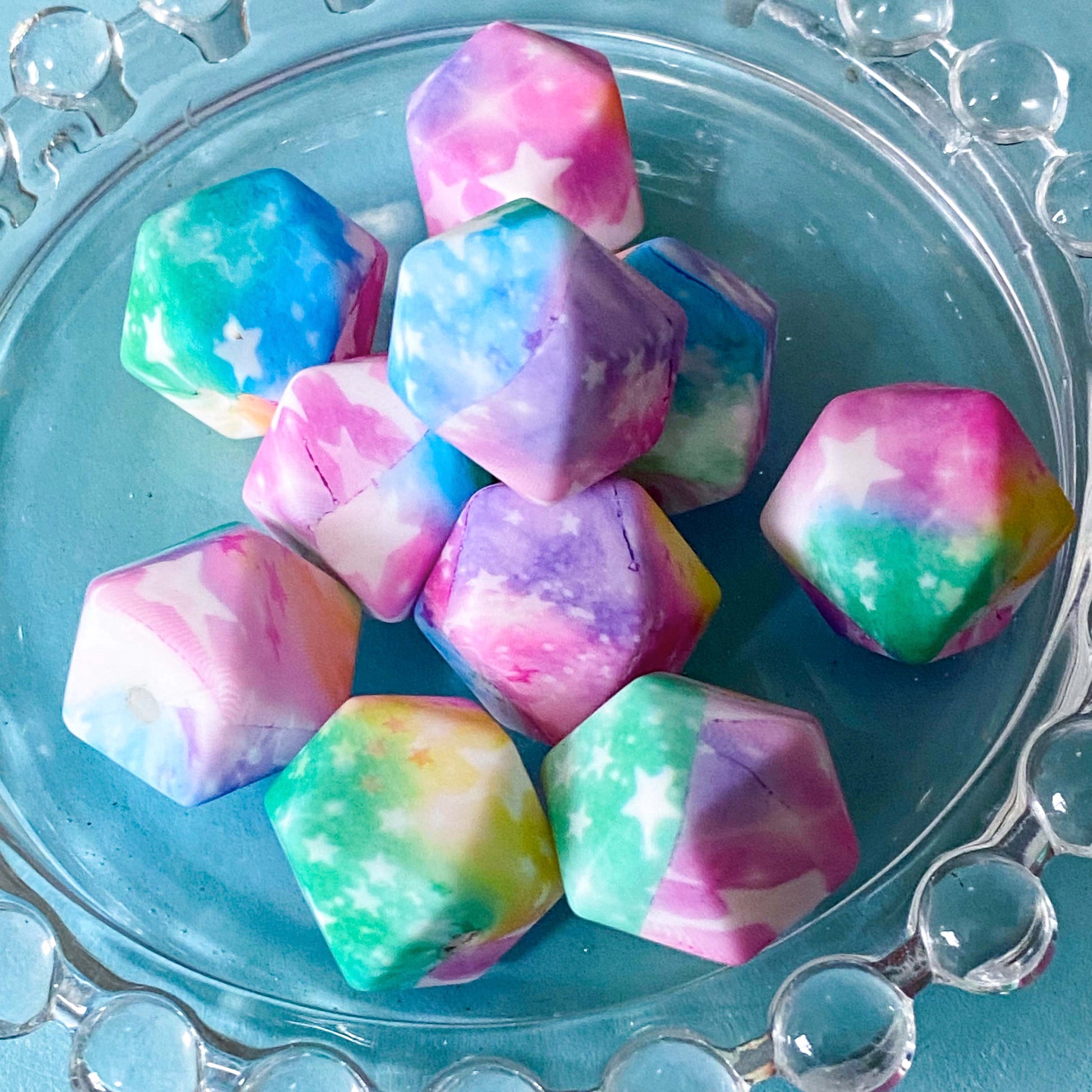 large 19mm hexagonal dodecagon silicone beads with an ombre pastel star pattern. lilac, pink, blue and mint green beads for jewellery making and beaded pens.