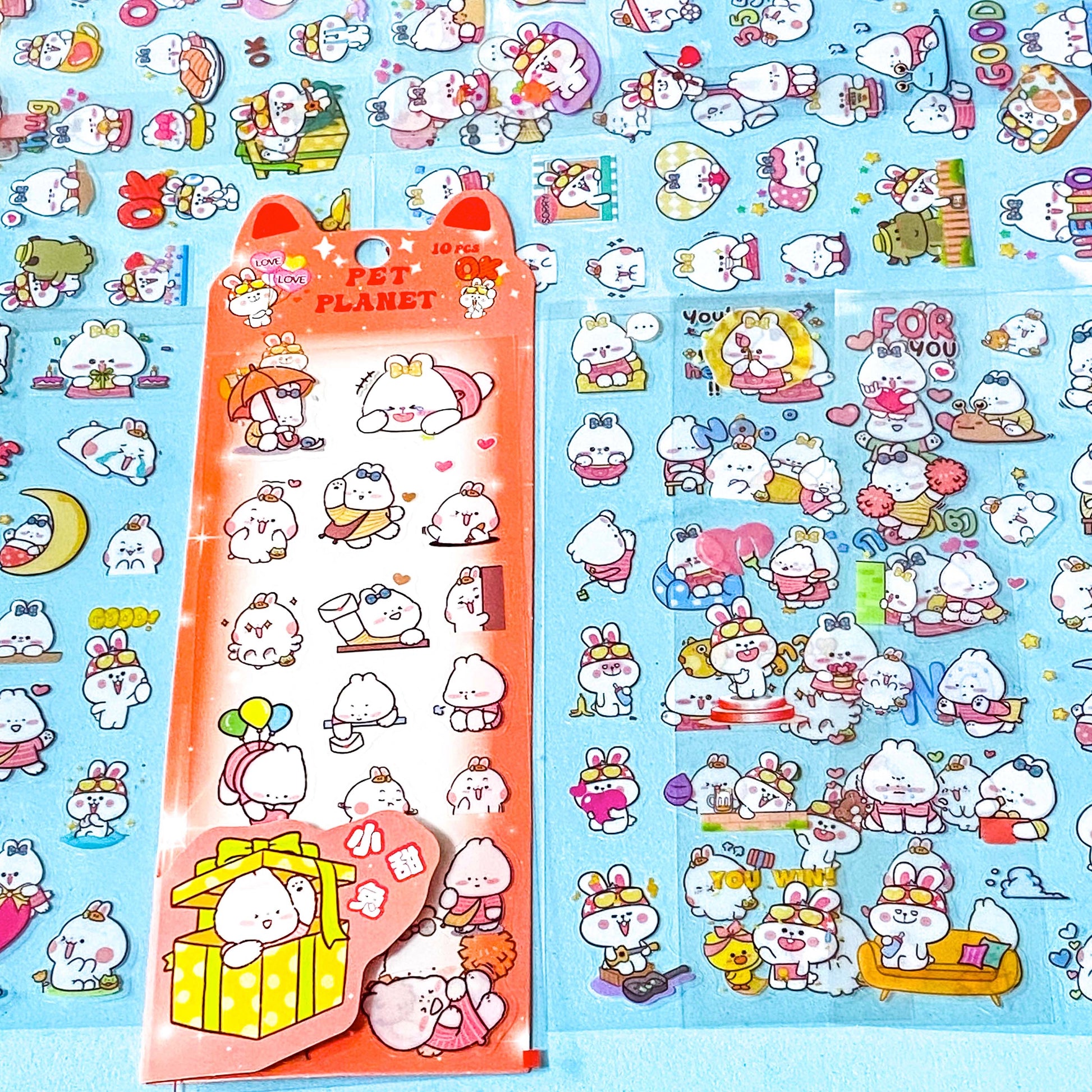 pet planet cartoon bunny rabbit pack of 10 clear sticker sheets in a pink pack on a blue background