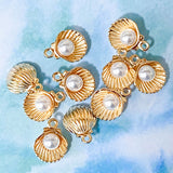 sea shell seashell seashells shells charm charms metal gold silver bright light warm yellow pink pearly small pendant pendants jewellery making supplies craft crafts shop store uk kawaii cute ocean spiral oyster