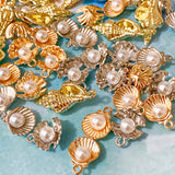 sea shell seashell seashells shells charm charms metal gold silver bright light warm yellow pink pearly small pendant pendants jewellery making supplies craft crafts shop store uk kawaii cute ocean spiral oyster