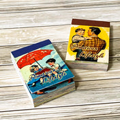 two mini vintage lifestyle sticker books with retro 1950s style illustrations on a wooden background