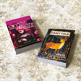 two mini sticker books in gothic forest and fairytale deer designs on a vintage patterned background