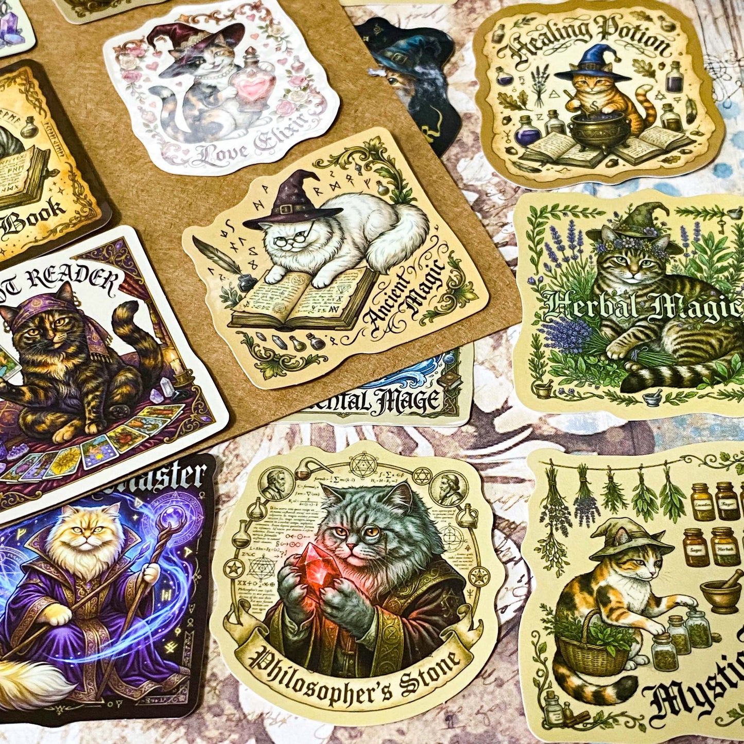 Collection of vintage magic witchy cat-themed laptop stickers with various designs on a textured surface.