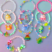 kids child child's bracelet stretch small little girl girl's pearl pearly ocean themed stretchy elasticated elastic bead beaded uk cute kawaii octopus fish shell glitter glittery starfish seahorse whale crab jellyfish