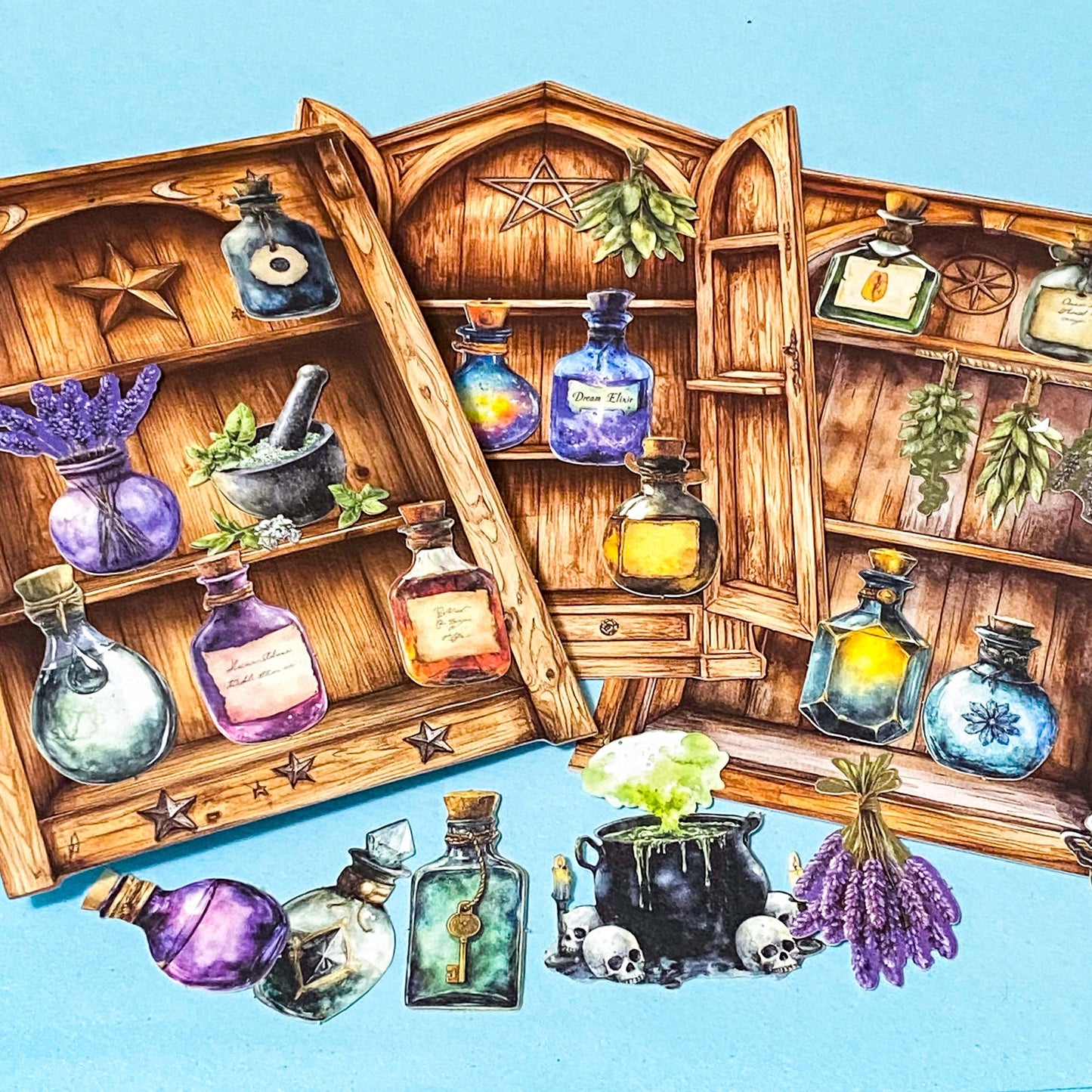 witches apothecary cabinet of curiosities ephemera pack with potion bottles, herbs, wooden shelves and cauldron on teal background