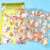set of 6 kawaii bunny clear plastic sticker sheets with pastel rabbits, flowers and gift illustrations on a blue background