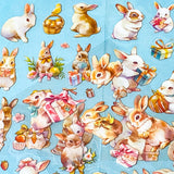 set of 6 kawaii bunny clear plastic sticker sheets with pastel rabbits, flowers and gift illustrations on a blue background
