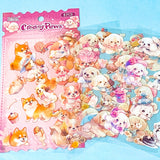 set of 6 kawaii puppy clear sticker sheets with pastel illustrations of cute dogs, desserts and accessories in a pink packet