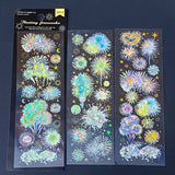 three clear holo PET sticker sheets featuring blue and green fireworks with shimmering aurora style reflections