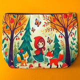 little red riding hood woodland canvas zip pouch featuring foxes, mushrooms and forest trees on a light yellow background. Bright autumn colours of red, orange and yellow. Uk cute gifts shop.