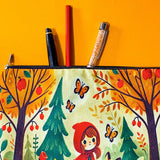 little red riding hood woodland canvas zip pouch featuring foxes, mushrooms and forest trees on a light yellow background. Bright autumn colours of red, orange and yellow. Uk cute gifts shop.