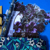 midnight petals letterbox gift set featuring a dark blue and green floral tapestry pouch, botanical ballpoint pen, blank flower greetings card and envelope, floral crystal and butterfly bracelet and dark floral clear sticker pack. uk cute and beautiful gift shop.