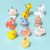 flocked furry fuzzy animal animals charm charms resin soft fluffy cute kawaii pendant pendants uk squirrel squirrels cat cats grey brown orange yellow duck ducks pig pigs seal seals giraffe giraffes ram sheep lamb guinea pig hamster gerbil fox foxes white silver tone metal hook