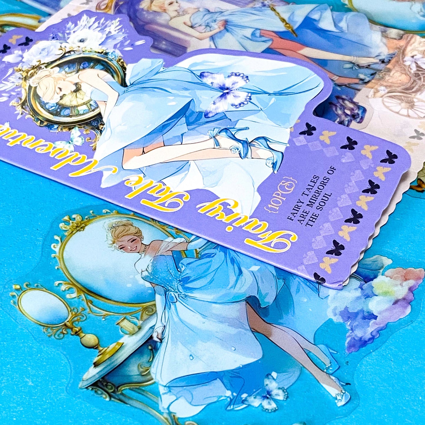 large Cinderella inspired clear PET sticker pack with dreamy blue princess illustrations, ornate mirrors, clocks, butterflies and fairytale carriage artwork