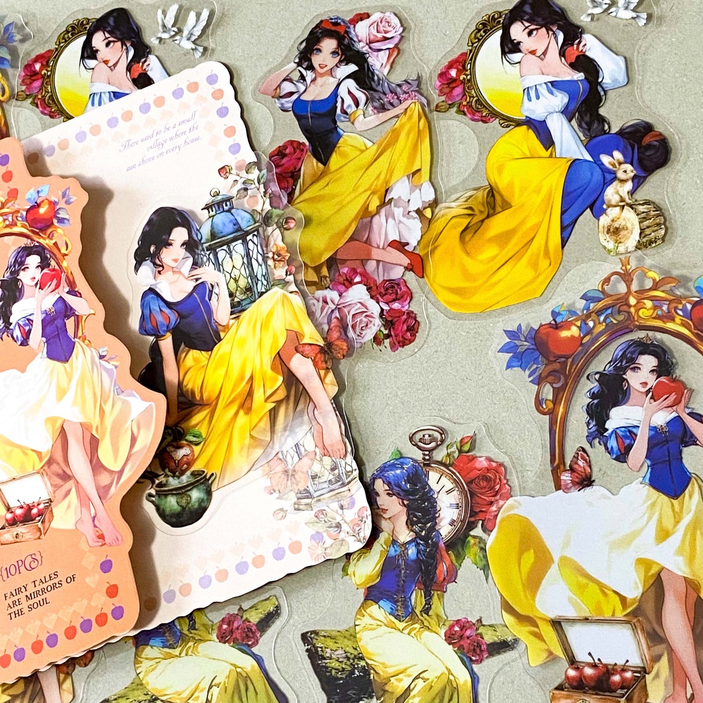 large snow white inspired clear PET sticker pack featuring enchanted apples, roses, lanterns, mirrors and princess illustrations in yellow, peach and blue tones. uk cute sticker shop