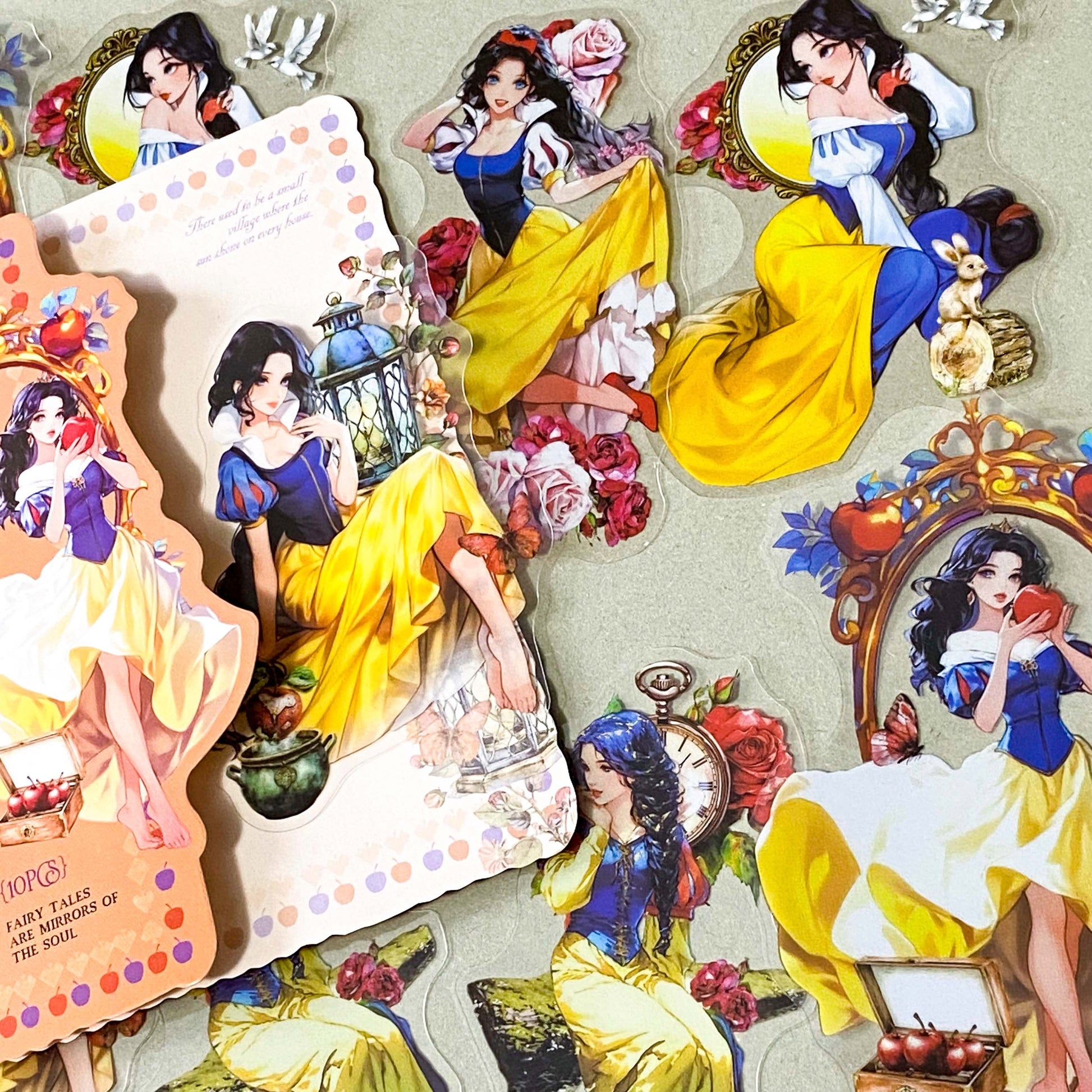 large snow white inspired clear PET sticker pack featuring enchanted apples, roses, lanterns, mirrors and princess illustrations in yellow, peach and blue tones. uk cute sticker shop