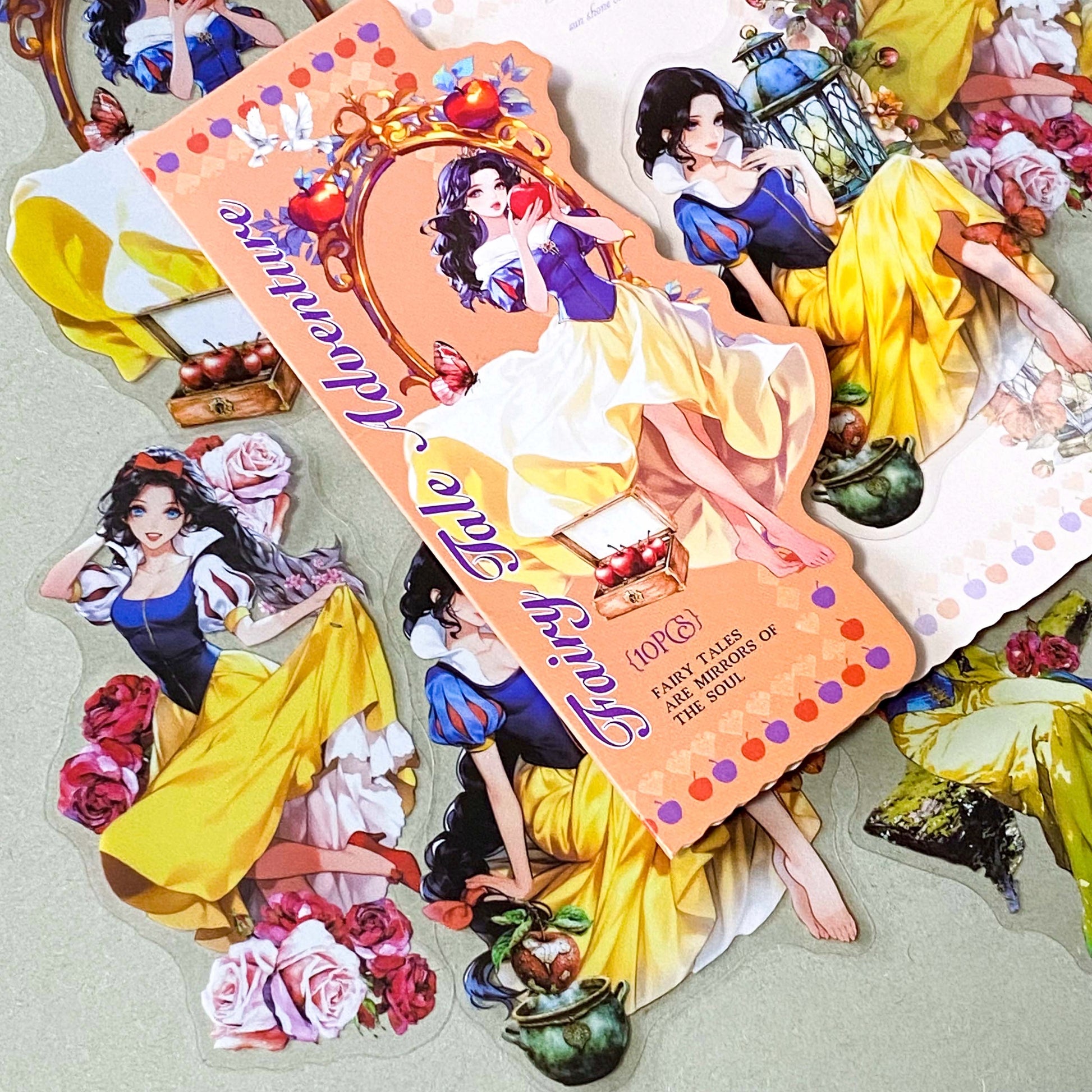 large snow white inspired clear PET sticker pack featuring enchanted apples, roses, lanterns, mirrors and princess illustrations in yellow, peach and blue tones. uk cute sticker shop