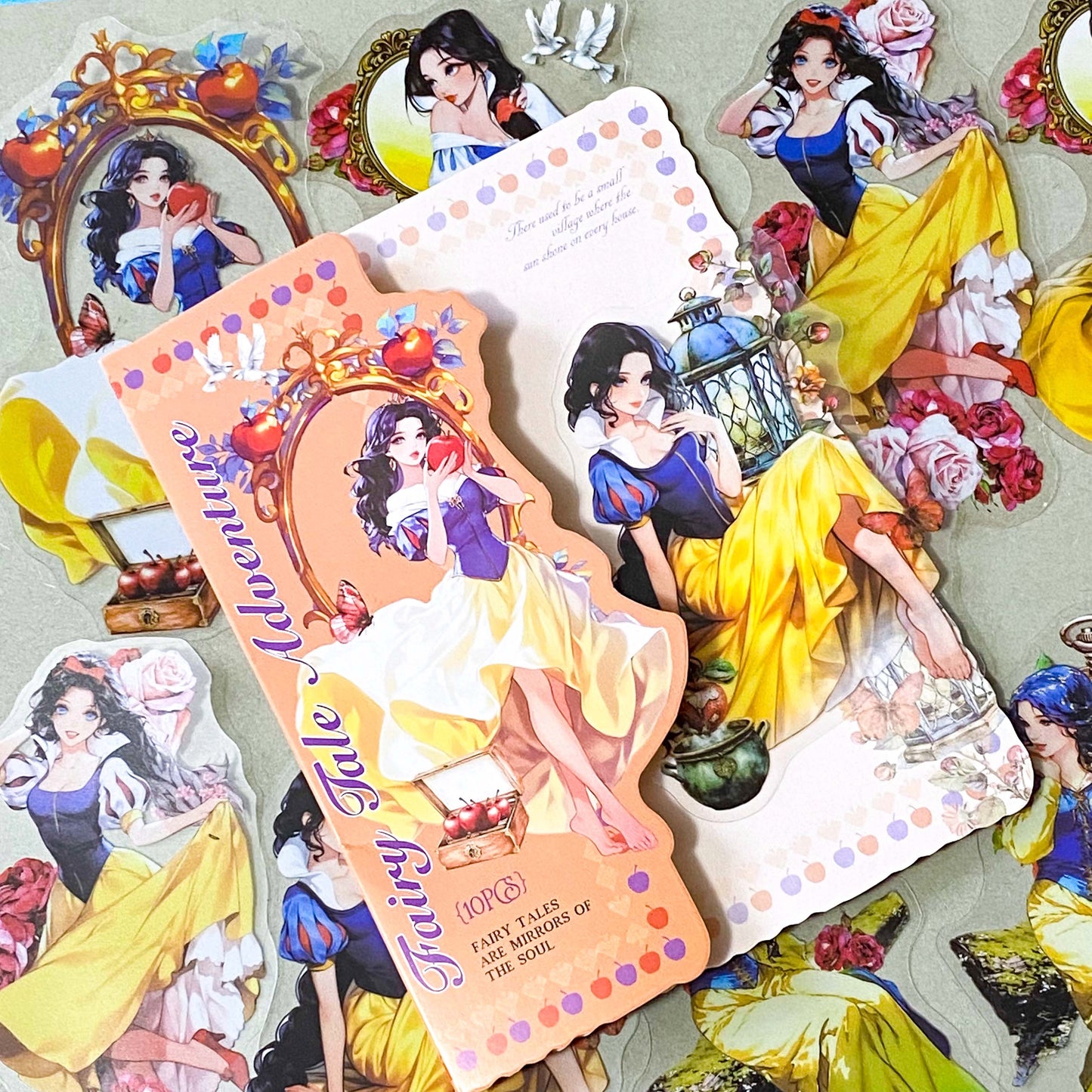 large snow white inspired clear PET sticker pack featuring enchanted apples, roses, lanterns, mirrors and princess illustrations in yellow, peach and blue tones. uk cute sticker shop