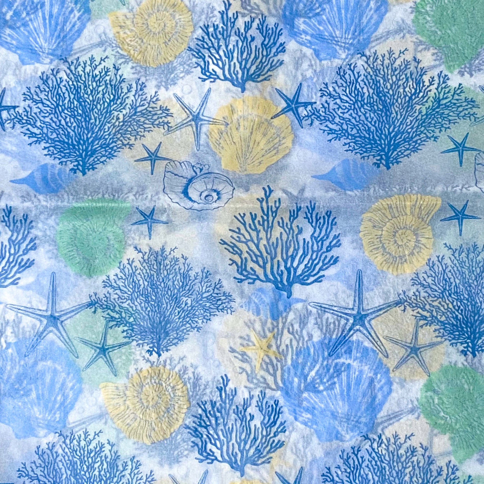 seashell starfish and coral ocean pattern tissue paper on a white background