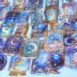 Decorative glass bottle stickers with celestial designs on a blue background