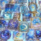 Collection of decorative bottle clear plastic stickers with celestial designs on a blue background
