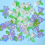 Assorted floral-shaped charms on a blue background