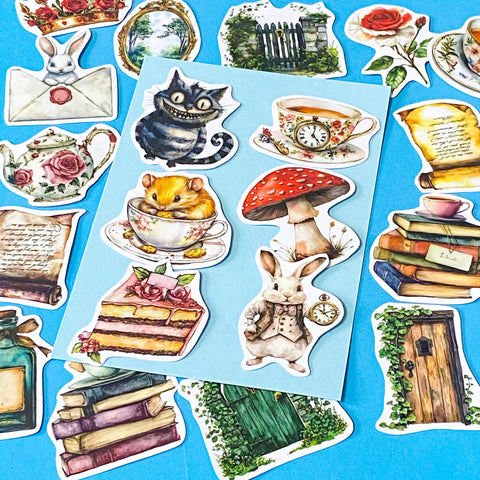 alice in wonderland inspired matte vinyl sticker pack of 20 featuring rabbits, tea cups, dormouse, books, mushroom, potion bottle, whiite rabbit and cheshire cat. uk cute stationery shop and planner supplies.