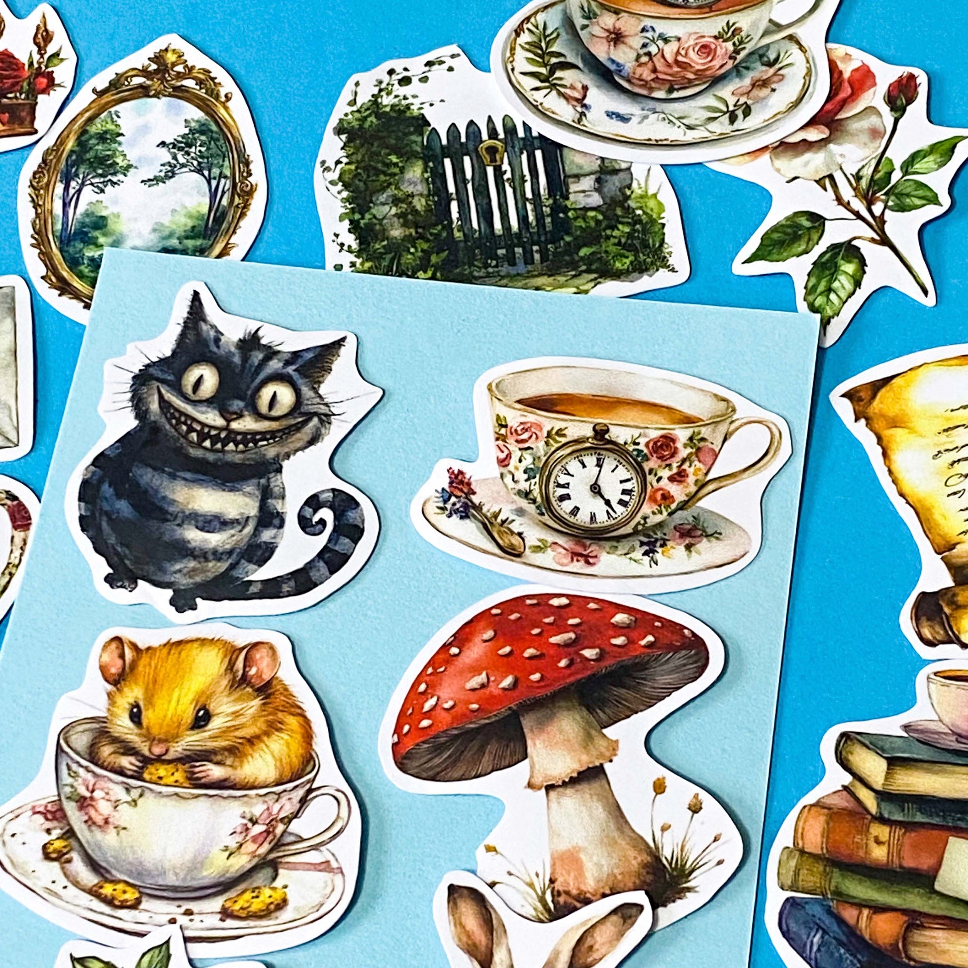 alice in wonderland inspired matte vinyl sticker pack of 20 featuring rabbits, tea cups, dormouse, books, mushroom, potion bottle, whiite rabbit and cheshire cat. uk cute stationery shop and planner supplies.