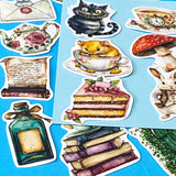 alice in wonderland inspired matte vinyl sticker pack of 20 featuring rabbits, tea cups, dormouse, books, mushroom, potion bottle, whiite rabbit and cheshire cat. uk cute stationery shop and planner supplies.