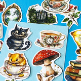 alice in wonderland inspired matte vinyl sticker pack of 20 featuring rabbits, tea cups, dormouse, books, mushroom, potion bottle, whiite rabbit and cheshire cat. uk cute stationery shop and planner supplies.