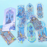 Decorative clear plastic bookmarks with fantasy castle and butterfly designs on a light blue background