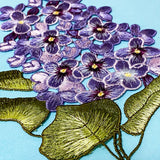 embroidered sew on very large hydrangea lilac and purple fabric applique patch on a blue background