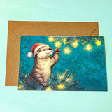 turquoise green blue colourful blank greetings card cards christmas festive glossy uk cute kawaii stationery otter otters cuddly winter christmas tree trees light lights pretty envelopes kraft brown set twinkling